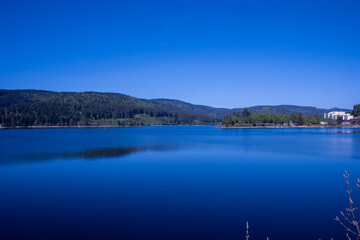 Schluchsee shimmers under the clear summer sky — a tranquil jewel of the Black Forest, perfect for sunlit reflections and peaceful escapes