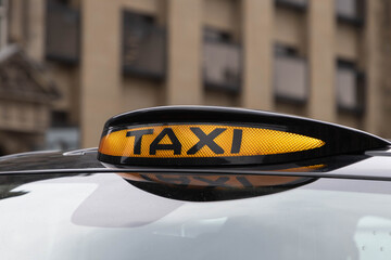 Taxi sign on an old cab in Edinburgh