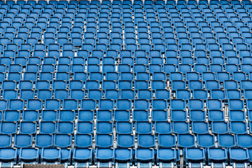 Fototapeta premium blue empty seats in a stadium