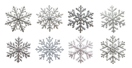 Glittering silver snowflakes isolated with intricate patterns. Each decorative flake features symmetrical winter-inspired shapes and frosty sparkle. Ideal for holiday designs, festive decor
