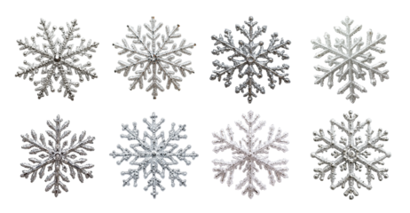 Glittering silver snowflakes isolated with intricate patterns. Each decorative flake features symmetrical winter-inspired shapes and frosty sparkle. Ideal for holiday designs, festive decor