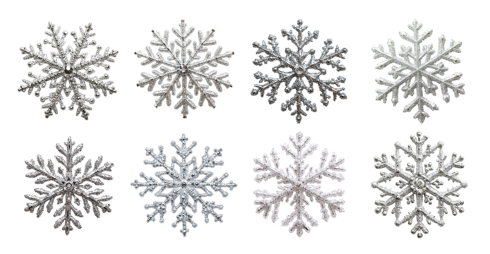Glittering silver snowflakes isolated with intricate patterns. Each decorative flake features symmetrical winter-inspired shapes and frosty sparkle. Ideal for holiday designs, festive decor