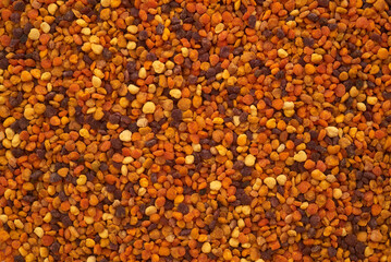 bee pollen granules macro background closeup