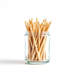 Wooden Toothpicks in a Cup. Toothpicks on White Background. Single Toothpick Close-Up