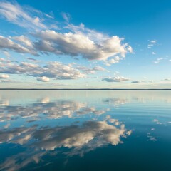 Fototapeta premium Serene Lake Reflection Under a Blue Sky