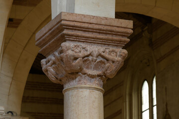 Romanesque capital with carved figures inside San Zeno Maggiore (Basilica di San Zeno), Verona,...