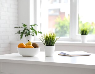 Fruits, plants, & notebook on white table by window