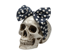 Skull bow polka dot bone decoration spooky Halloween party white black isolated cheerful playful head human accessory fashion festive celebration creepy macabre grinning teeth jaw eye socket