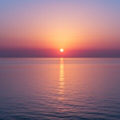 Fototapeta premium Pink And Purple Sunset Over Calm Ocean Water