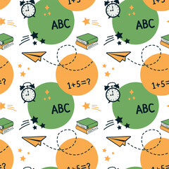 Playful seamless school pattern with ABC letters, books, and learning elements