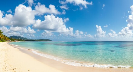 Fototapeta premium Panoramic view of a stunning tropical paradise beach with white sand, turquoise water, and a beautiful blue sky.