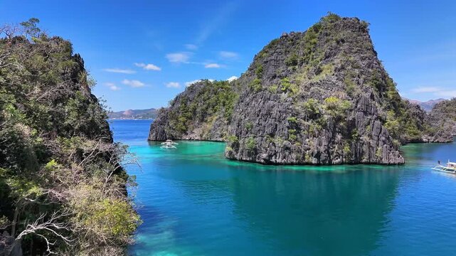 Aerial perspective of the beautiful Twin Lagoon, rocky hills and turquoise waters, Coron, Philippines