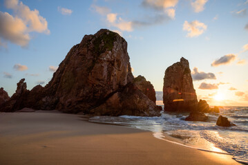 Dramatic Rock Formations at Ursa Beach in Sintra, Portugal at Sunset on Atlantic Coast. Amazing natural background, ladscape