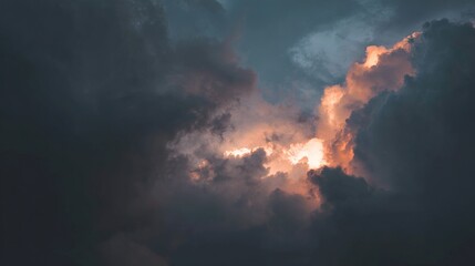 Blue and Orange Cloudy Sky Background with Light Through Clouds – Vibrant Hues Blending in Cloud Layers, Sunbeams Piercing Through for a Dazzling Atmospheric Scene