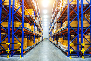 Fototapeta premium Interior of a Modern Retail Warehouse full of Shelves with Goods in Cardboard Boxes and Packages. Logistics, Sorting and Distribution Facility for Product Delivery.