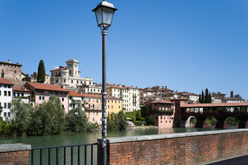 Bassano del Grappa, Vicenza, Veneto, Italy - July 9, 2025 - Views of the city, the castle, and the Alpine Bridge