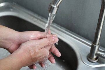 Wash your hands to clean germs.