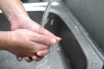 Fototapeta premium Wash your hands to clean germs.