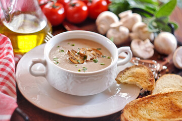 Creamy mushroom soup in ceramic bowl
