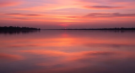 Naklejka premium Beautiful Sunset Reflection Over Calm Lake