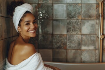 Beautiful woman relaxing in bathtub wearing bathrobe and towel turban