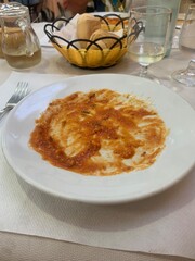 Empty plate of pasta with a Bolognese sauce