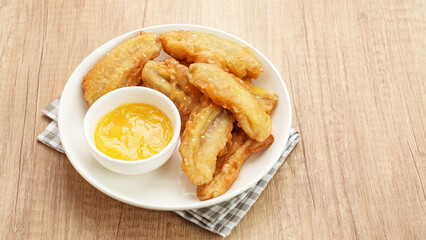 Fried banana with kaya jam or pisang goreng selai srikaya, Indonesian food
