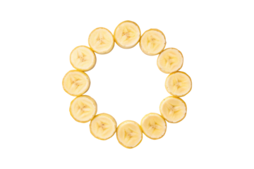 Twelve banana slices arranged in a perfect circular pattern forming ring, isolated on a transparent background