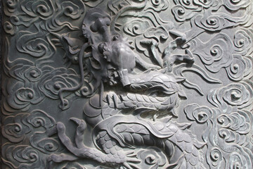 sculpted dragon in a buddhist (?) temple (zojo-ji) i tokyo in japan 