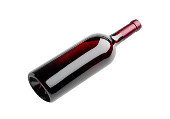 Red glossy wine bottle lays isolated on white with studio lighting, for product staging and branding.
