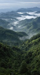 Fototapeta premium Misty mountain range, verdant valleys
