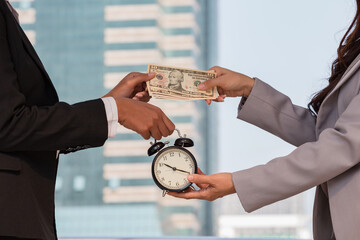 Hands of professional businesspeople trading clock for money outdoors in urban setting, representing concept of financial planning, efficiency, and work value.