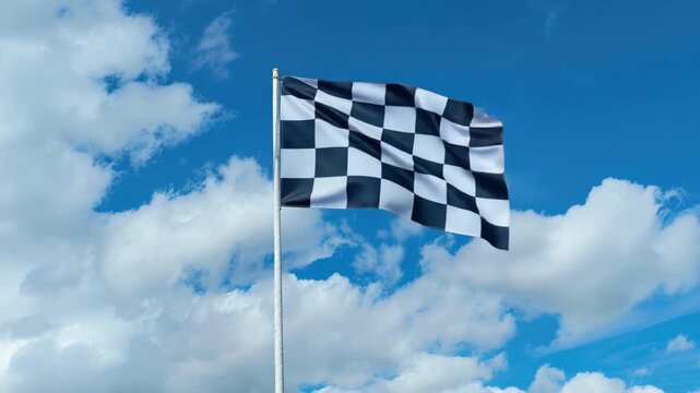 Bavarian flag waving against blue sky with clouds