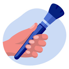 Hand holding makeup brush in blue color on soft background  