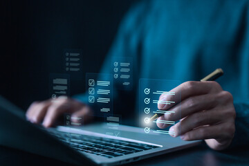 Digital checklist and task management concept with a man using a laptop and pen to interact with a virtual interface for productivity, planning, and project organization. checklist document