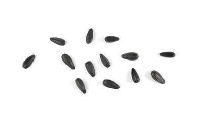 Sunflower seeds pile isolated, black oil sun flower grains group with shell, fresh edible oil seeds heap
