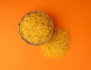 Raw vermicelli, gold soup pasta, small homemade noodles, thin Italy macaroni