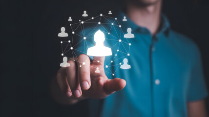 Man's hand touching digital network of people icons, representing connection and technology