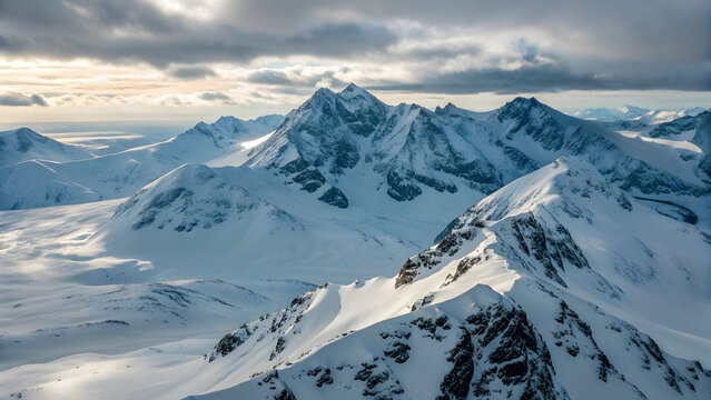 Majestic snow covered mountain range under dramatic cloudy sky full hd 4k stock image download winter