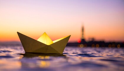 Illuminated Paper Boat on Water at Sunset