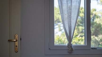 Minimalist interior with curtain and window view