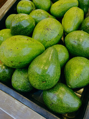 Fresh ripe avocado texture and background close up, Avocado on fruit market store.