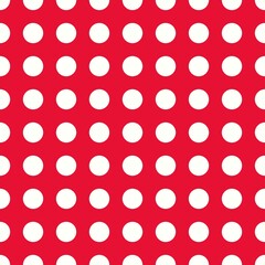White polka dots on a red background 
