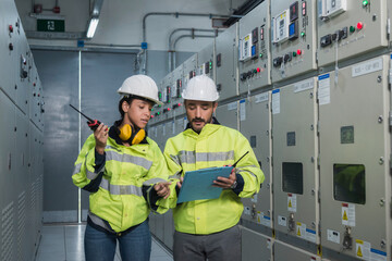 electrician working in a factory. electrician at work. electrician working in a power station....