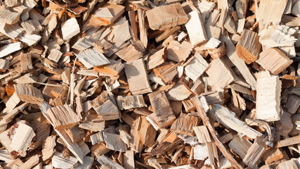 The photo shows a close-up of wood chips