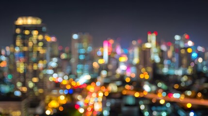 Fototapeta premium Night city lights blur showing many buildings.