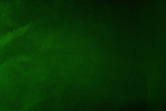 Black dark deep emerald green abstract background. Shiny silk fabric. Metallic shine. Light reflection bright. Design. Template. Minimal. Blank.