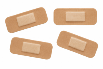Four Adhesive Bandages Arranged in a Dynamic Composition for Medical and First Aid Applications