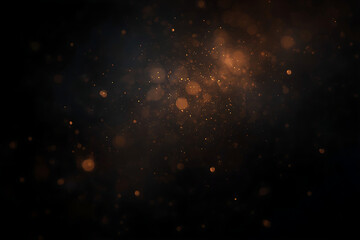 Fototapeta premium The image features a dark abstract background with deep black tones, soft orange blurry light flares, scattered light particles, and subtle lens scratches, creating a moody cinematic texture.