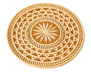 Handwoven round placemat with an intricate geometric pattern on a transparent background